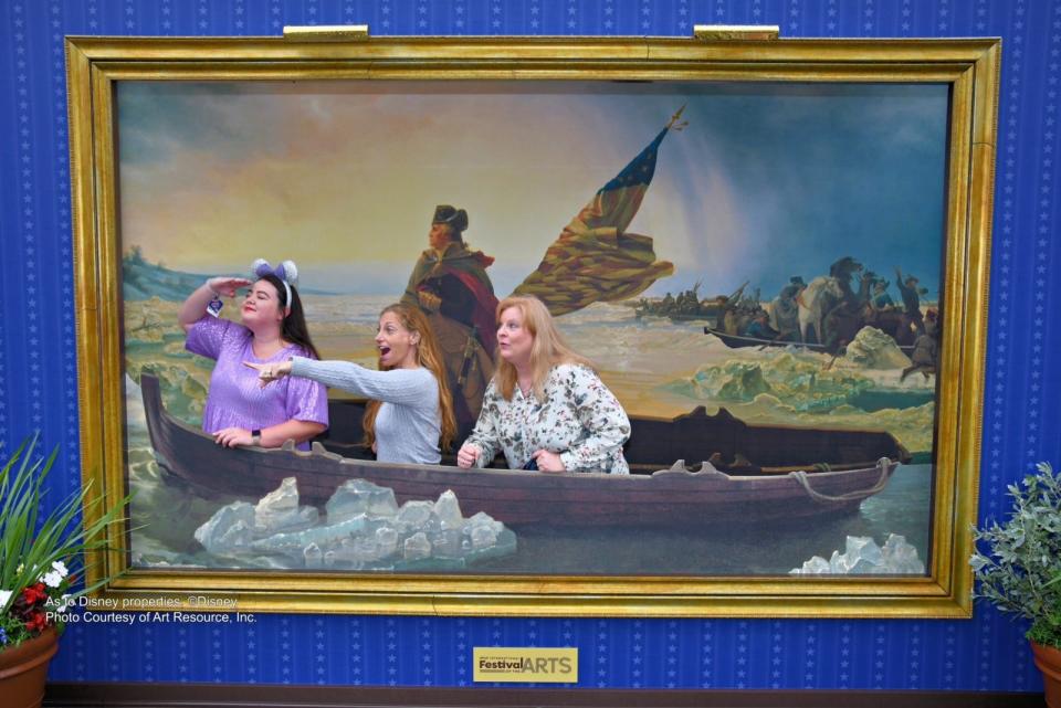 Travel writer Megan duBois and FLORIDA TODAY writers Michelle Spitzer and Suzy Fleming Leonard pose in an EPCOT version of Emanuel Gottlieb Leutze's "Washington Crossing the Delaware" during a visit to EPCOT's International Festival of the Arts.