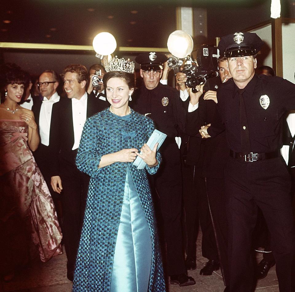 <p>In 1965, Princess Margaret wore a blue dress and coat with a stunning tiara during a visit to America. The Princess attended an event at the Hollywood Palladium in Los Angeles with Lord Snowdon.</p>