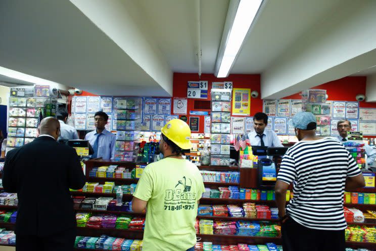 Customers watch for the winning number. Photo from Getty