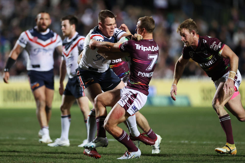 Lindsay Collins, pictured here being tackled by Daly Cherry-Evans during the Roosters' clash with Manly.