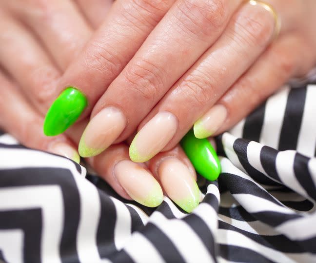 acrylic nail manicure with neon green nails