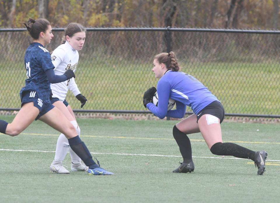 Cate Burns of Spencerport makes a save in the first half. Baurns was stellar all season for the Rangers.