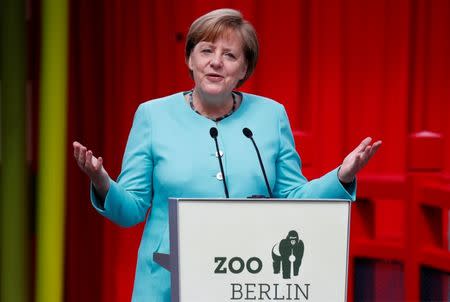 German Chancellor Angela Merkel delivers a speech during a welcome ceremony for Chinese panda bears Meng Meng and Jiao Qing at the Zoo in Berlin, Germany July 5, 2017. REUTERS/Fabrizio Bensch
