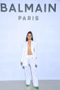 <p>La vidéaste web française, plus connue sous le nom de Léna Situations, aurait pu prendre place sur le podium lors du défilé Balmain tant sa tenue respecte l’ADN de la collection Printemps-Eté 2022 signée Olivier Rousteing. ©Getty Images</p> 