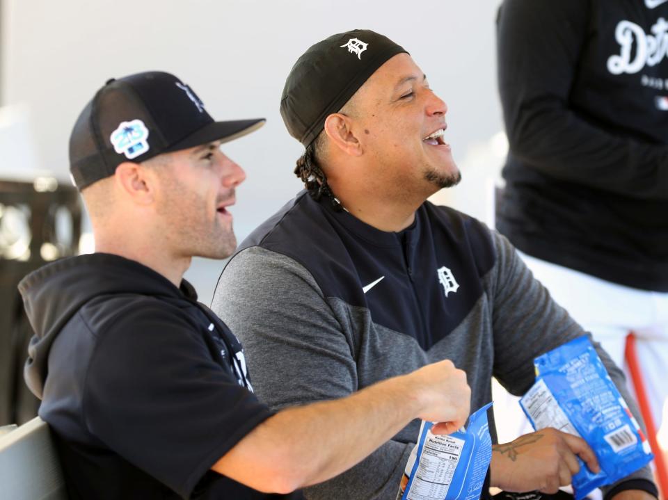 Detroit Tigers infielder Miguel Cabrera and hitting coach  Michael Brdar in the dugout during the first full squad workout of Spring Training Monday, February 20, 2023.