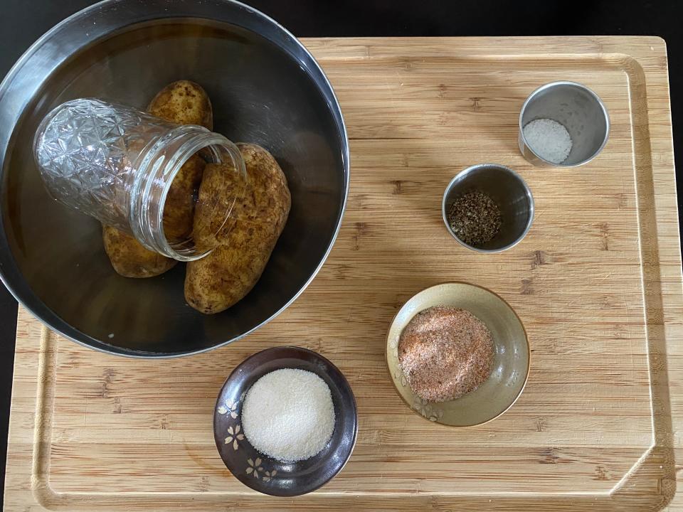 guy fieri baked potato ingredients on cutting board