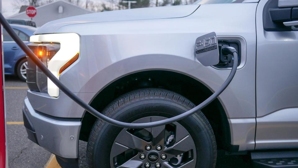 Ford F150 Lightning charging at Tesla station