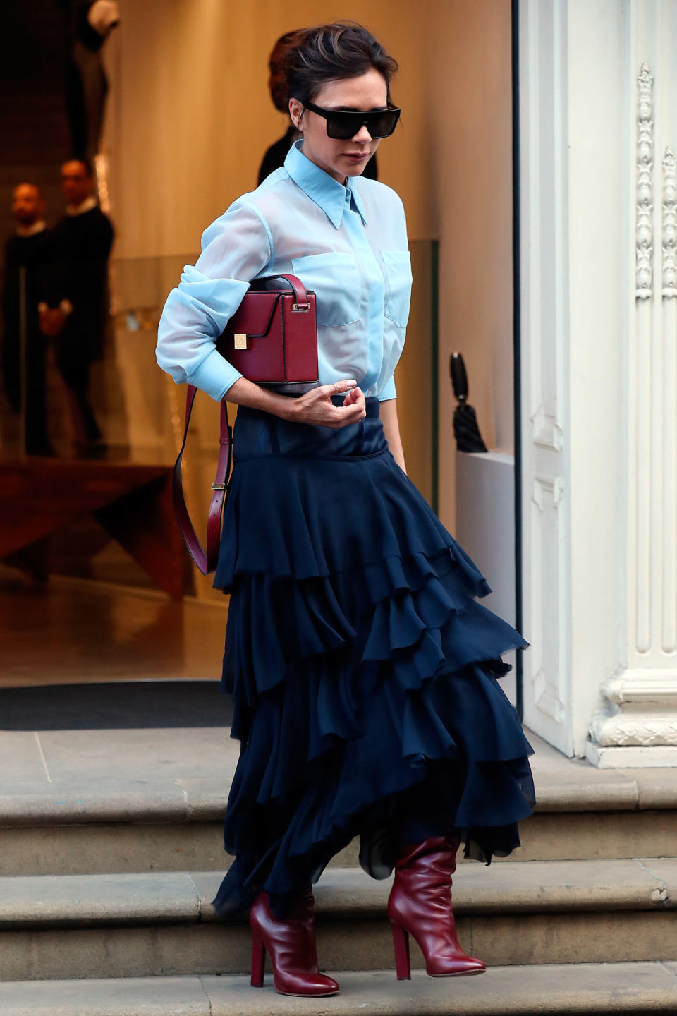 <p><strong>22 September </strong>Victoria Beckham looked effortlessly polished as she left her London store wearing a blue shirt, boots and a ruffled skirt.</p>