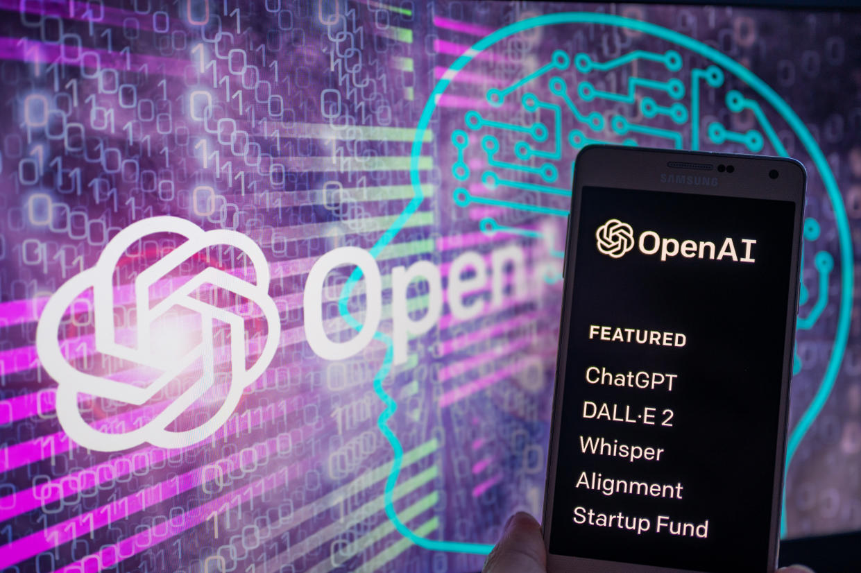 OpenAI logo seen on screen with ChatGPT website displayed on mobile seen in this illustration, on January 8, 2023 in Brussels, Belgium. (Photo illustration by Jonathan Raa/NurPhoto via Getty Images)