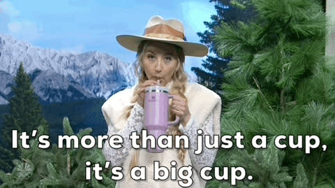 Person sipping from a large cup with text "It's more than just a cup, it's a big cup."