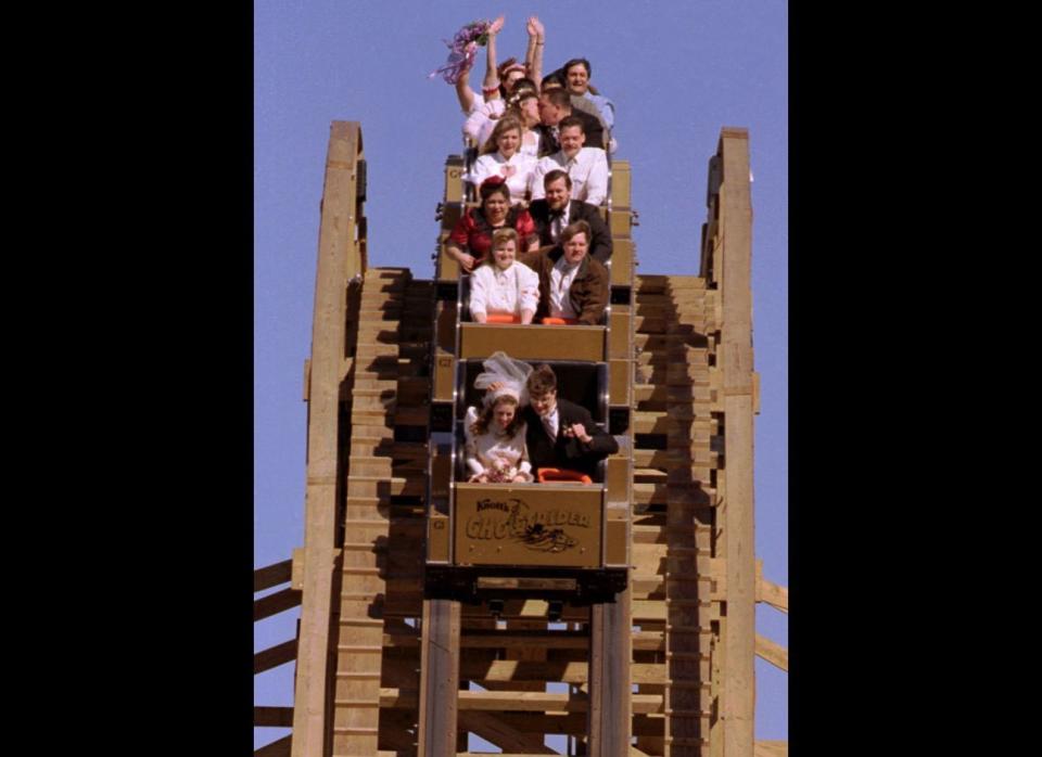 On Feb. 12, 1999, 13 couples boarded the Ghostrider Coaster at Knott's Berry Farm in Buena Park, Calif., for the ride of their lives. They happily said "I do" while zipping through the air, experiencing their first run of the ups and downs that come with being married. Wonder if they got to cut in line for the ride? 