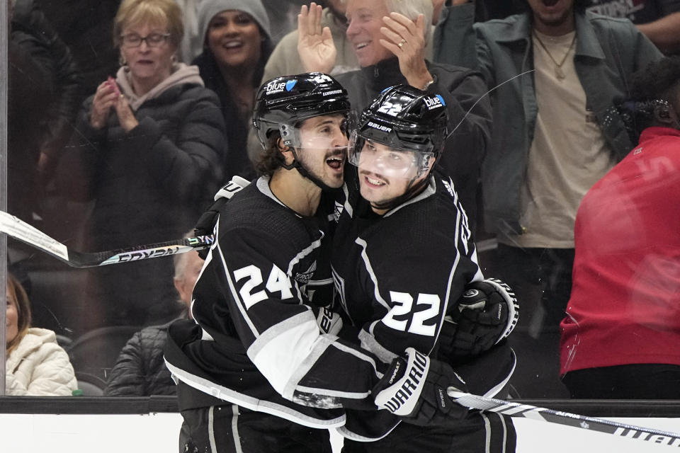 Los Angeles Kings left wing Kevin Fiala, right, celebrates his goal with center Phillip Danault during the second period of an NHL hockey game against the St. Louis Blues Saturday, Nov. 18, 2023, in Los Angeles. (AP Photo/Mark J. Terrill)