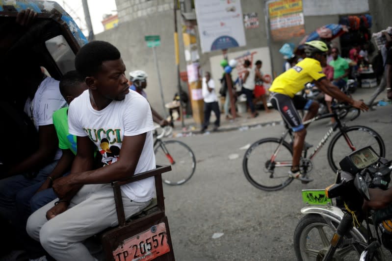 The Wider Image: Haiti's cyclists brave protests and poor roads in race for gold