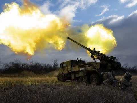 Ukrainian servicemen fire with a CAESAR self-propelled howitzer towards Russian positions in eastern Ukraine (AFP via Getty Images)