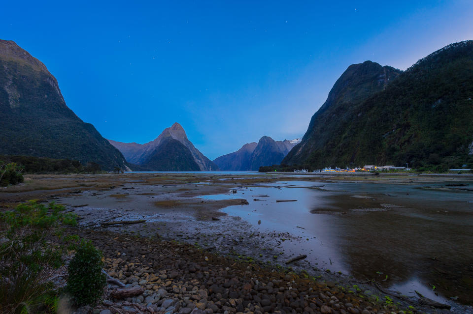 Milford sound in the evening sky with the stars