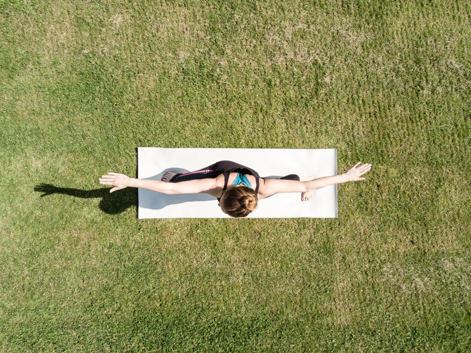 There’s no better time than summer to try yoga as heat affects flexibility. [Photo: Getty]