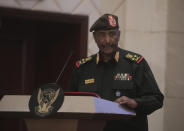 Sudan's Army chief Gen. Abdel-Fattah Burhan speaks following the signature of an initial deal aimed at ending a deep crisis caused by last year's military coup, in Khartoum, Sudan, Monday, Dec. 5, 2022. Sudan’s coup leaders and the main pro-democracy group have signed a deal to establish a civilian-led transitional government following the military takeover last year. But key players refused to participate, and no deadline was set for the transition to begin. (AP Photo/Marwan Ali)