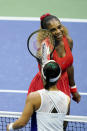 Serena Williams, of the United States, top taps rackets with Kristie Ahn, of the United States, after winning their first-round match of the US Open tennis championships, Tuesday, Sept. 1, 2020, in New York. (AP Photo/Seth Wenig)