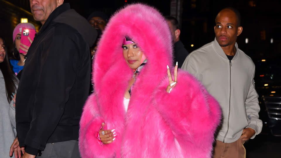 The pink coat — a nod to Minaj's new album "Pink Friday 2" — was a Haute Couture look from Alexandre Vauthier. - James Devaney/Getty Images