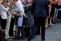 <p>A boy looks at President Donald Trump as he departs the White House for Asia, in Washington, Nov. 3, 2017. (Photo: Carlos Barria/Reuters) </p>