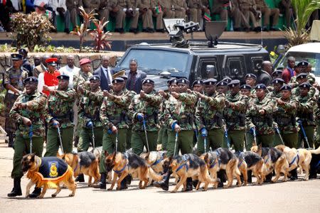 A police dog unit takes part in a parade during Kenya's Mashujaa Day (Hero's Day) celebrations at the Uhuru park in Nairobi, Kenya, October 20, 2017. REUTERS/Baz Ratner