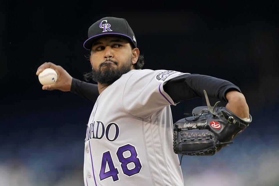 Colorado Rockies starting pitcher German Marquez throws to the Washington Nationals in the first inning of a baseball game, Thursday, May 26, 2022, in Washington. (AP Photo/Patrick Semansky)