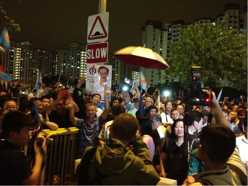 WP supporters chant Lee Li Lian's name even after the rally ends.