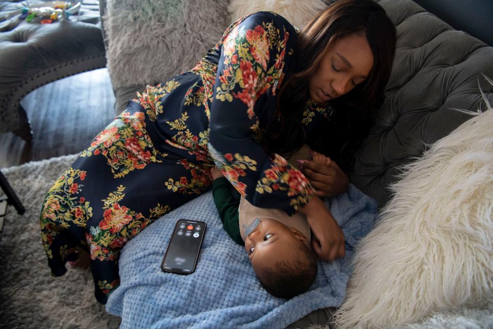 Sen. London Lamar D- Memphis, cares for her 7-month-old son Nylinn, while doing an over the phone interview at her apartment in Nashville, Tenn., Wednesday, March 13, 2024.