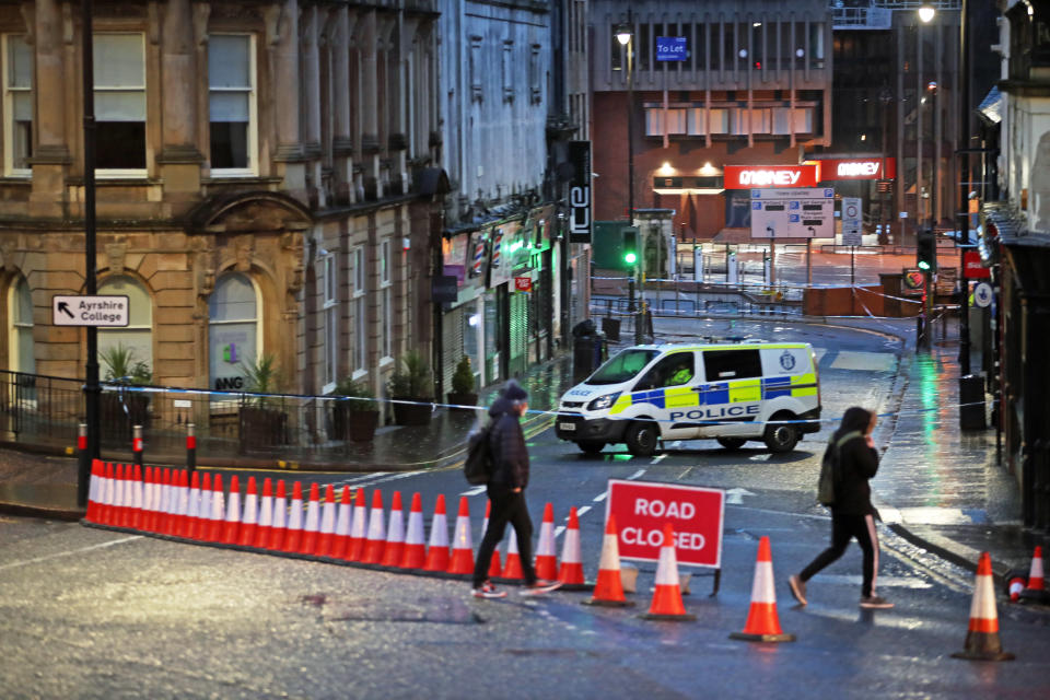 A police cordon at West George Street in Kilmarnock, where officers continue to investigate what Police Scotland describe as a "serious incident" in the grounds of a local hospital and another location in the area. Picture date: Friday February 5, 2021.