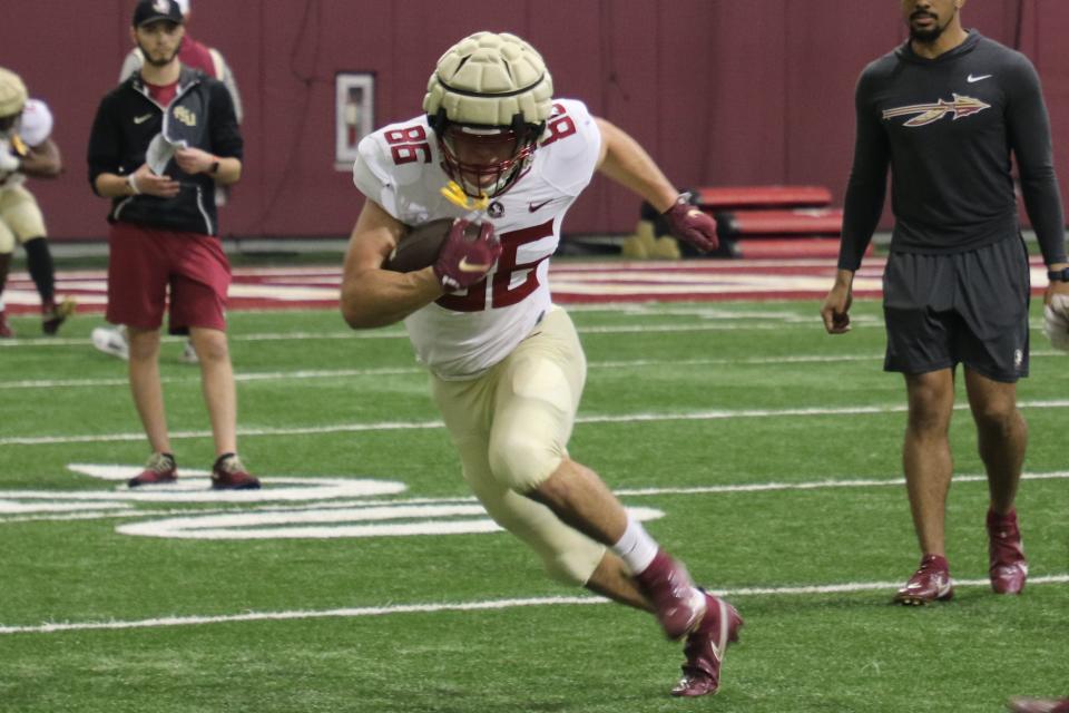 FSU tight end Brian Courtney goes through a drill during the Seminoles' fourth spring football practice on Friday, March 11, 2022.