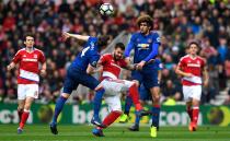 <p>Fellaini and Jones go into a challenge with Negredo </p>