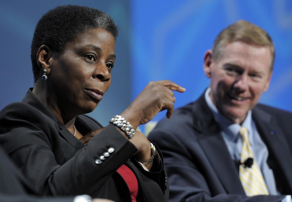 FILE - In this Wednesday, Jan. 11, 2012, file photo, Ursula Burns, president and chief executive officer of Xerox, talks as Alan Mulally, president and chief executive officer of Ford, looks on during a Power Panel discussion at the 2012 International CES in Las Vegas. Xerox says Burns won’t be CEO after the company splits in two later in 2016. Burns became CEO of Xerox in 2009, becoming the first black woman to lead a Fortune 500 company. Xerox says after the split she will become chairman of a newly formed document technology company. (AP Photo/Jack Dempsey, File)