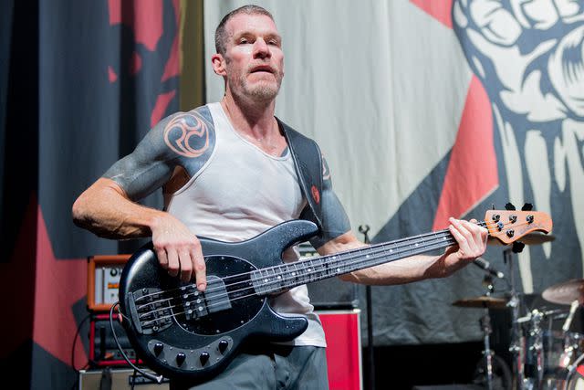 <p>Ollie Millington/Redferns</p> Tim Commerford of Rage Against the Machine performs in London in August 2019