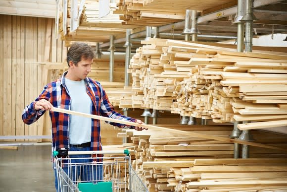 A customer buying lumber.