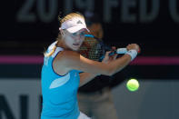 France's Kristina Mladenovic plays a shot against Australia's Ajla Tomljanovic during their Fed Cup tennis final in Perth, Australia, Saturday, Nov. 9, 2019. (AP Photo/Trevor Collens)