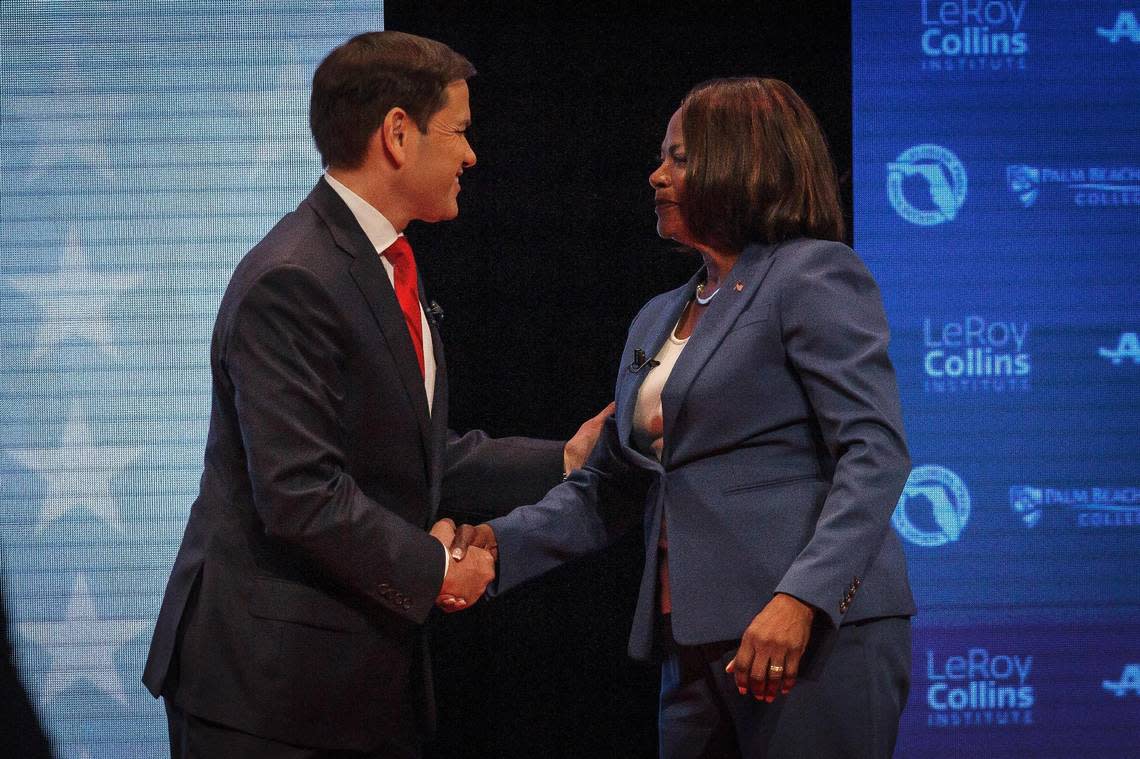 Sen. Marco Rubio, R-Fla., and U.S. Rep. Val Demings, D-Fla., greet each other before a televised debate at Duncan Theater on the campus of Palm Beach State College in Palm Beach County, Fla., on Tuesday, Oct. 18, 2022.