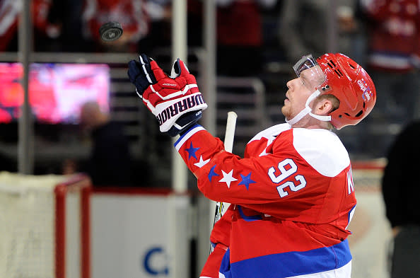 WASHINGTON, DC - FEBRUARY 24: Evgeny Kuznetsov #92 of the Washington Capitals tosses a puck to the fans after the game against the Edmonton Oilers at Verizon Center on February 24, 2017 in Washington, DC. (Photo by Greg Fiume/NHLI via Getty Images)