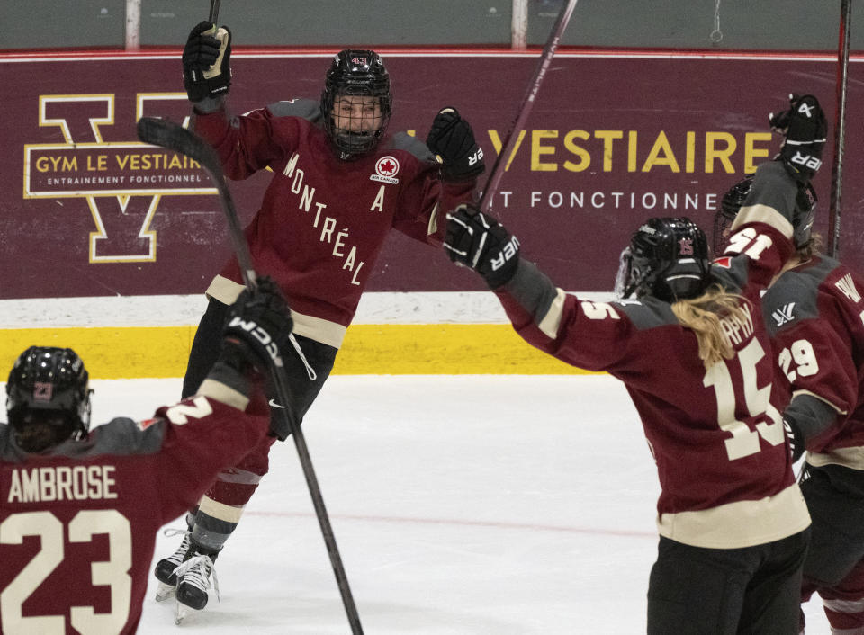 Montreal's Kristin O'Neill (43) celebrates her goal against Minnesota during the third period of a PWHL hockey game Thursday, April 18, 2024, in Montreal. (Christinne Muschi/The Canadian Press via AP)