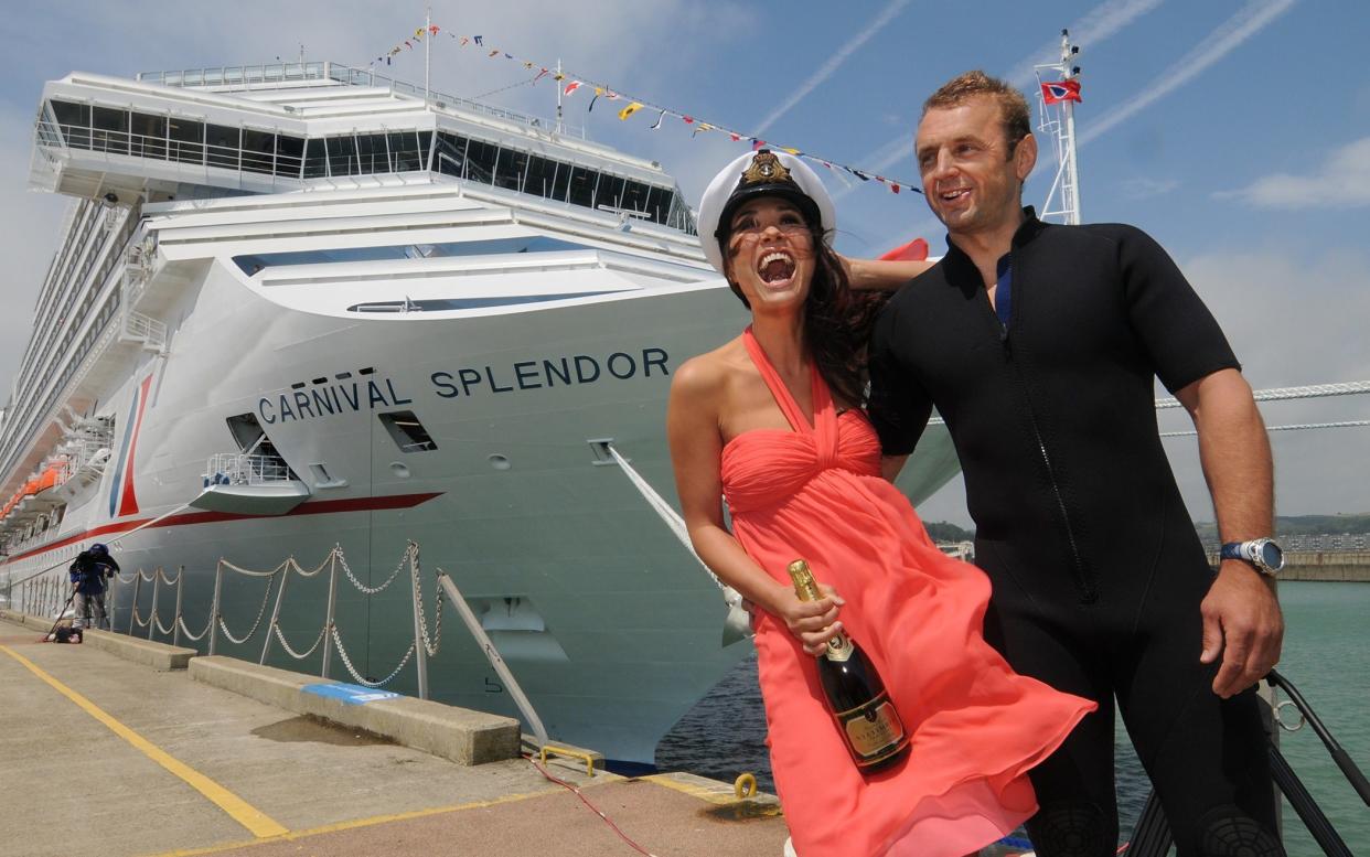 Myleene Klass poses with Royal Navy Diver Chris Rumming as Klass officially names and Launches 'Carnival Splendor' Cruise Ship