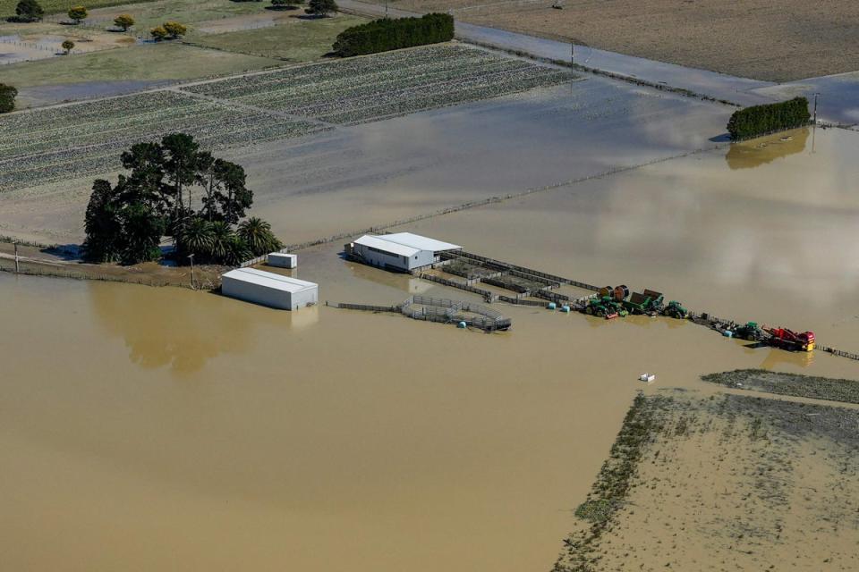 An aerial view shows the damage left by Cyclone Gabrielle in the Esk Valley near Napier on 18 February (AFP via Getty Images)