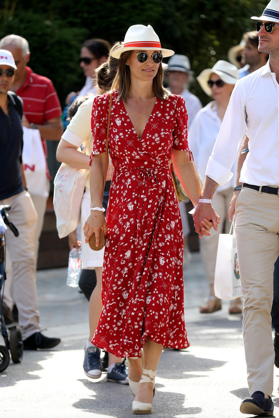 On May 27, Pippa Middleton sparked pregnancy rumours at the French Open in a printed Ralph Lauren dress [Photo: Getty]