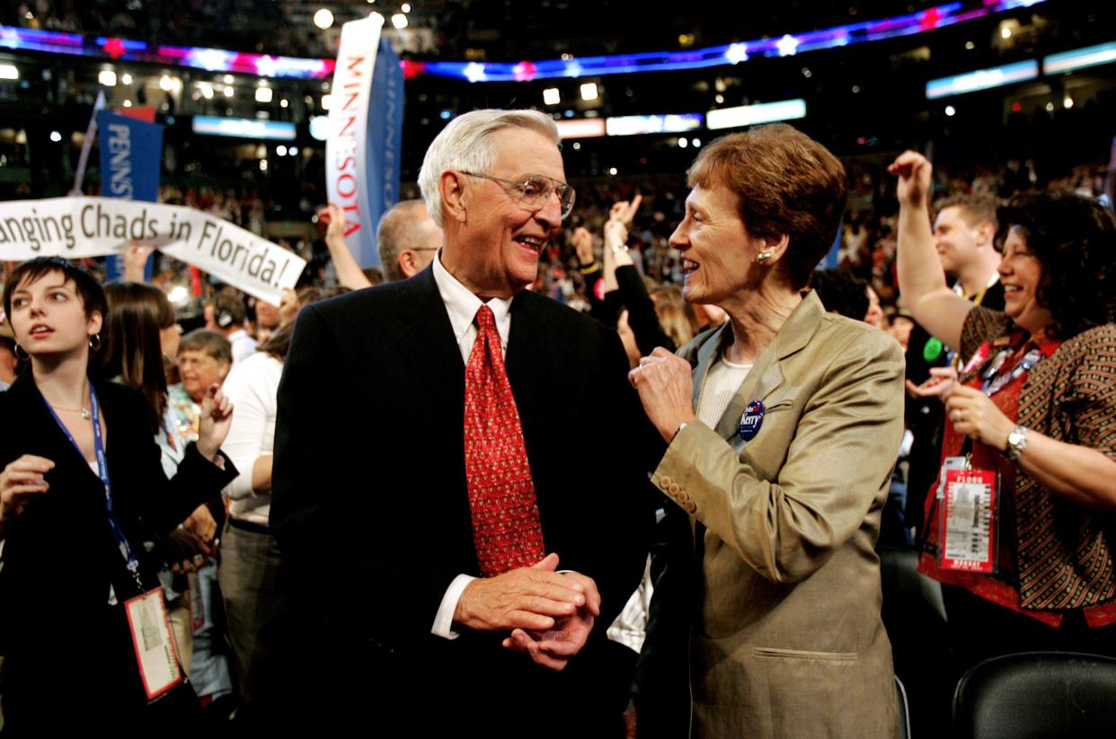 FILE - In this Monday, July 26, 2004, file photo, former Vice President Walter Mondale smiles with his wife, Joan, in the Minnesota delegation during the Democratic National Convention at the FleetCenter in Boston. 