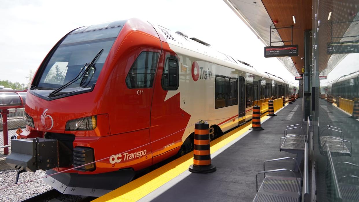 A Stadler FLIRT train makes a stop at South Keys station during a media tour on Thursday. OC Transpo says operators should complete their mandatory training hours by mid-June. (Patrick Louiseize/CBC - image credit)