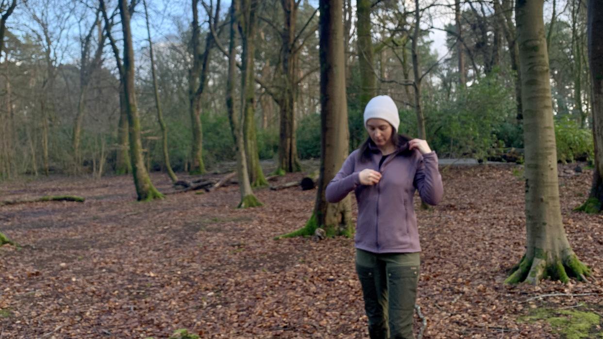  Julia Clarke unzipping fleece. 