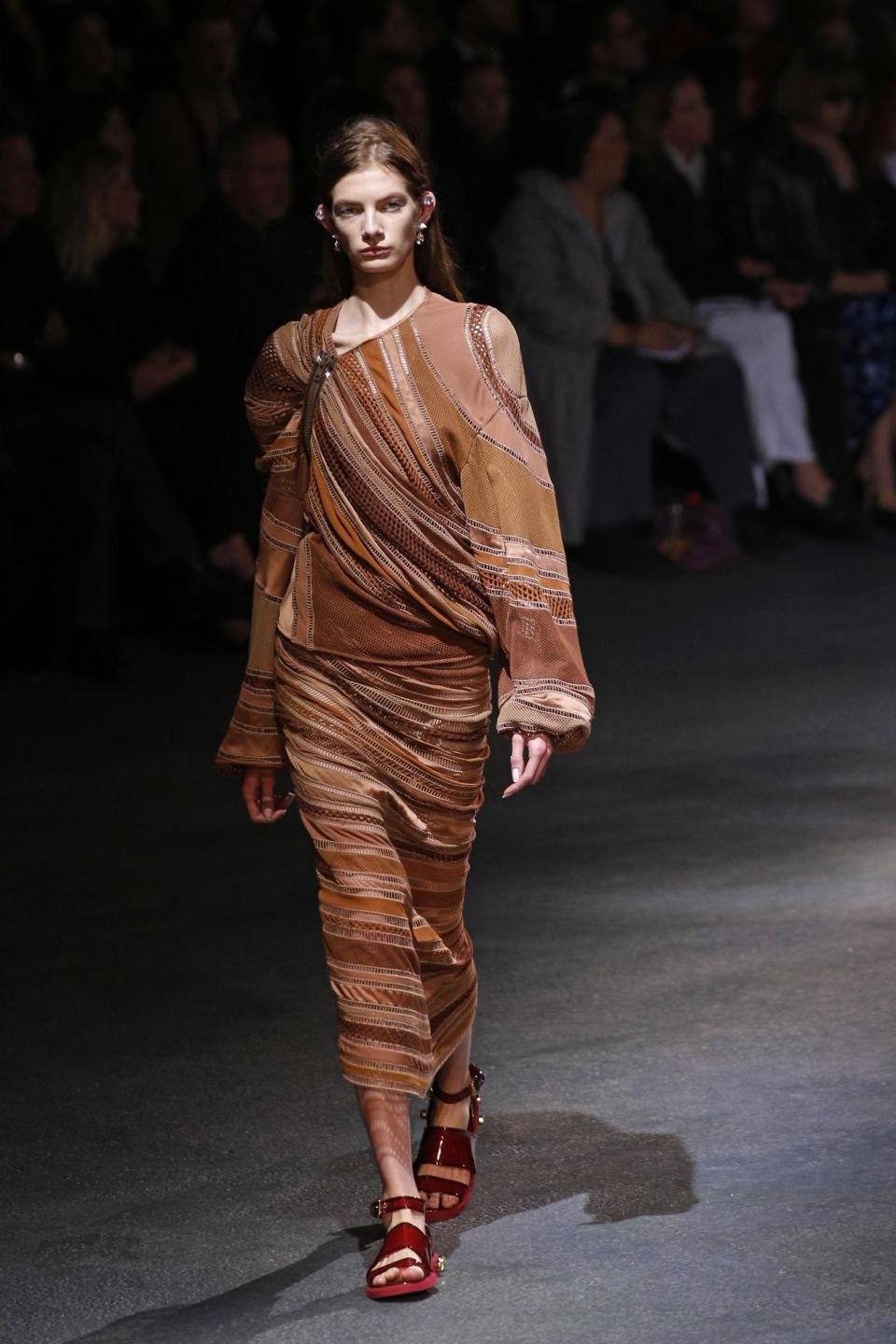 A model presents a creation as part of Givenchy's ready-to-wear Spring/Summer 2014 fashion collection, presented Sunday, Sept. 29, 2013 in Paris. (AP Photo/Christophe Ena)