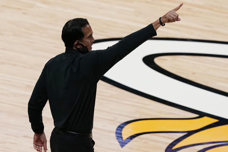 Miami Heat head coach Erik Spoelstra gestures during the second half of an NBA basketball game against the Houston Rockets, Monday, April 19, 2021, in Miami. (AP Photo/Marta Lavandier)