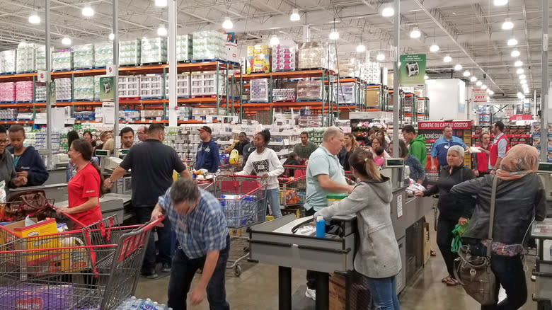 customers in Costco checkout line