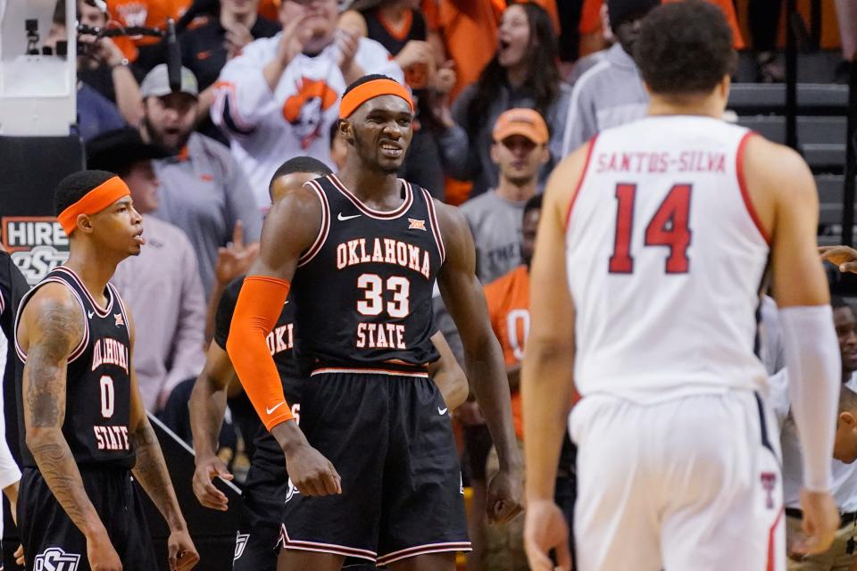 Oklahoma State forward Moussa Cisse (33) reacts after blocking a shot in the second half against Texas Tech on Saturday in Stillwater.