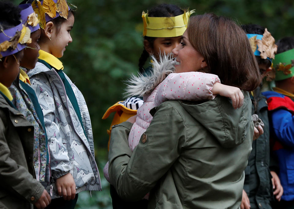 Kate gives out hugs to school children at Sayers Croft Forest School and Wildlife Garden (Getty)