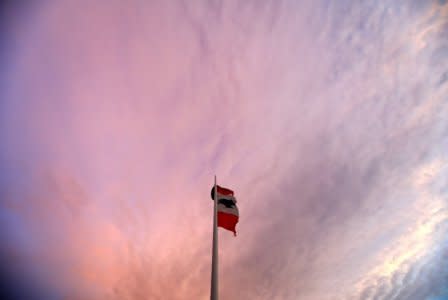 Lebanese flag flutters on a pole at sunset in Beirut, Lebanon, November 5, 2018. REUTERS/Jamal Saidi